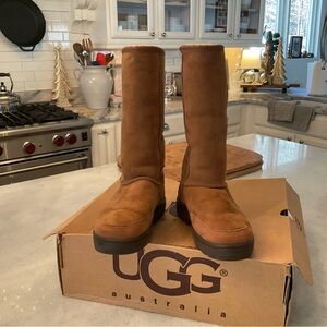 Ugg ultra tall chestnut 5245
Size 6